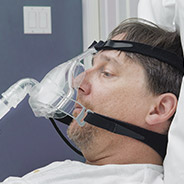 Man with CPAP mask in place